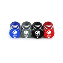Load image into Gallery viewer, 4pcs Grin Jaw Skull Logo Tire Valve Caps
