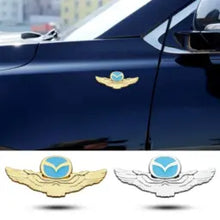 Load image into Gallery viewer, Mazda Wings Emblem - Gold &amp; Silver

