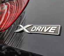 Load image into Gallery viewer, 3D Chrome E S X DRIVE Sticker for BMW X1 X2 X3 X5 X6 X7 I3 Z4 G12 E39 E46 E60 E87 E90 F10 F30 3 5 7 Series Metal Car Body Emblem
